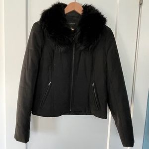 Size S black jacket with faux collar.